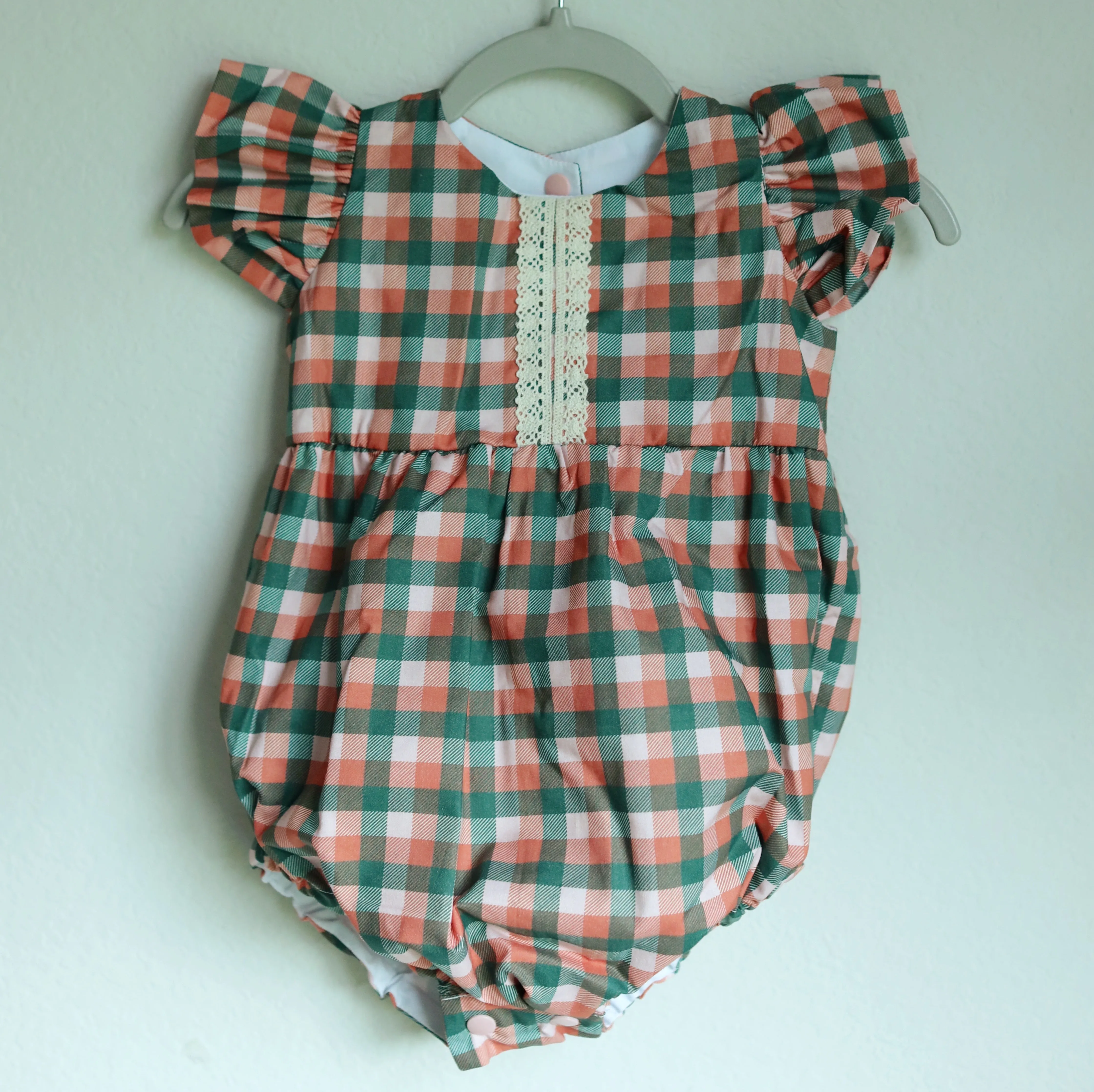 Infant Girl's Muted Red and Green Plaid Christmas Bubble Romper with Ivory Trim